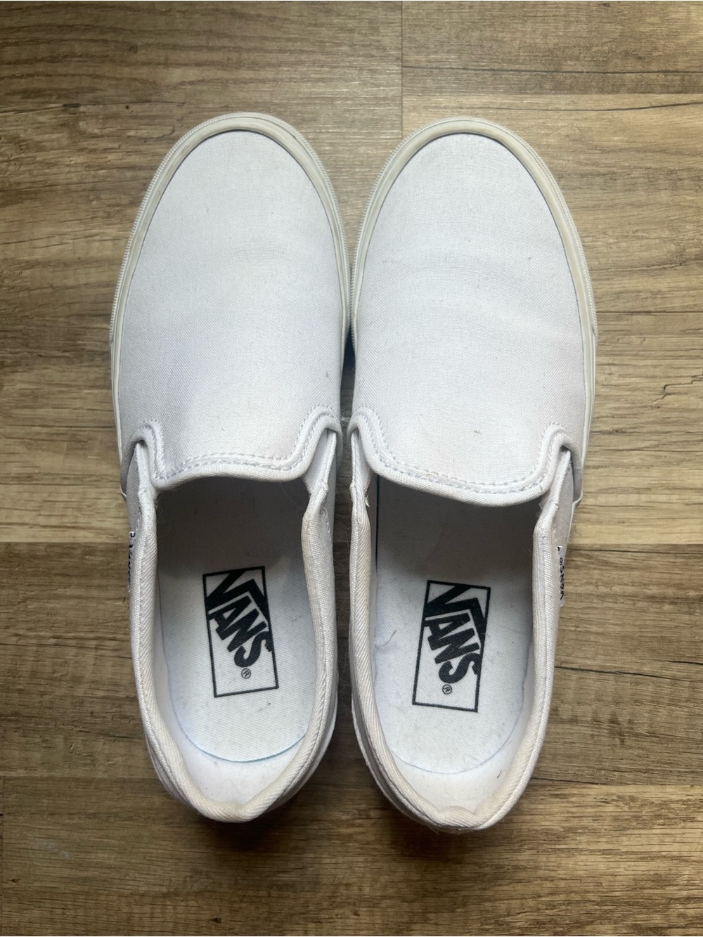 Vans White Canvas Slip-On Sneakers